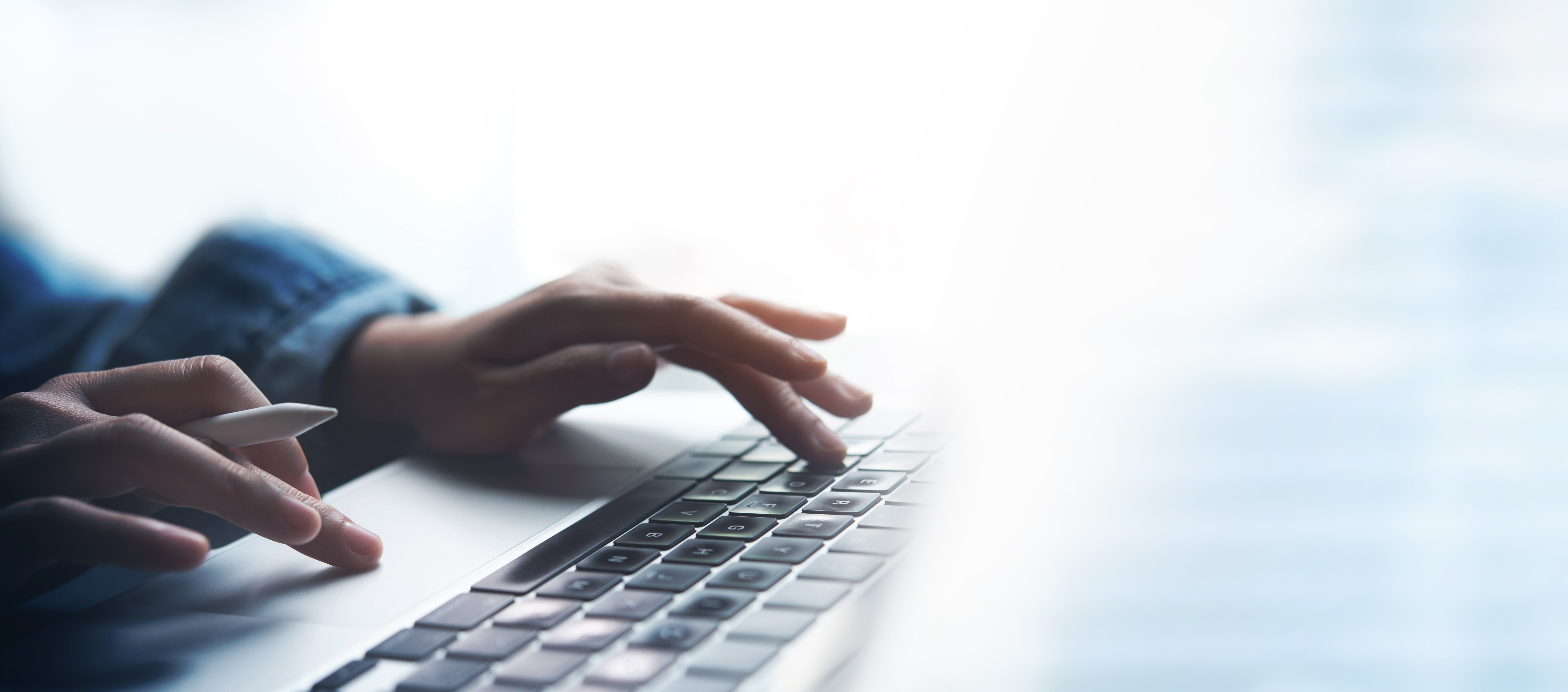 worker typing on computer